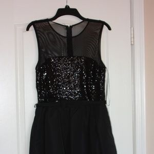 Beautiful holiday black dress with sequins and tulle